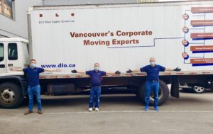 DLO office moving experts - DLO team social distancing in front of truck