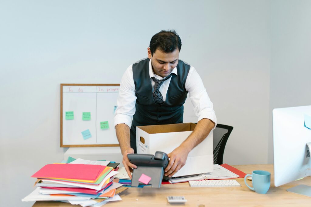 man in the middle of an office move